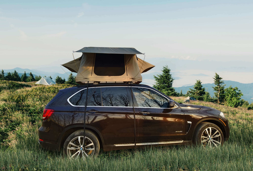 Glamping car rooftop tents